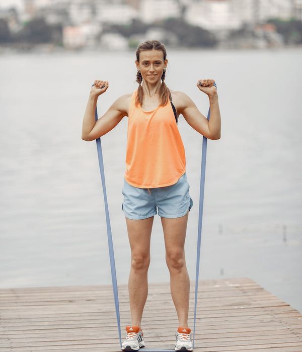 Woman feeling energetic and balanced during a morning cardio routine.